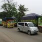 Sumber gambar: Tangerang Daily/Foto Eko Setiawan/Truk pengangkut tanah terparkir di bahu Jalan Husein Sastranegara, Benda, Kota Tangerang