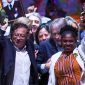 Newly elected Colombian President Gustavo Petro (L) and his running mate Francia Marquez  celebrate at the Movistar Arena in Bogota, on June 19, 2022 after winning the presidential runoff election on June 19, 2022.  Ex-guerrilla Gustavo Petro was on Sunday elected the first ever left-wing president of crisis-wracked Colombia after beating millionaire businessman rival Rodolfo Hernandez after a tense and unpredictable election. (Photo by Juan BARRETO / AFP)